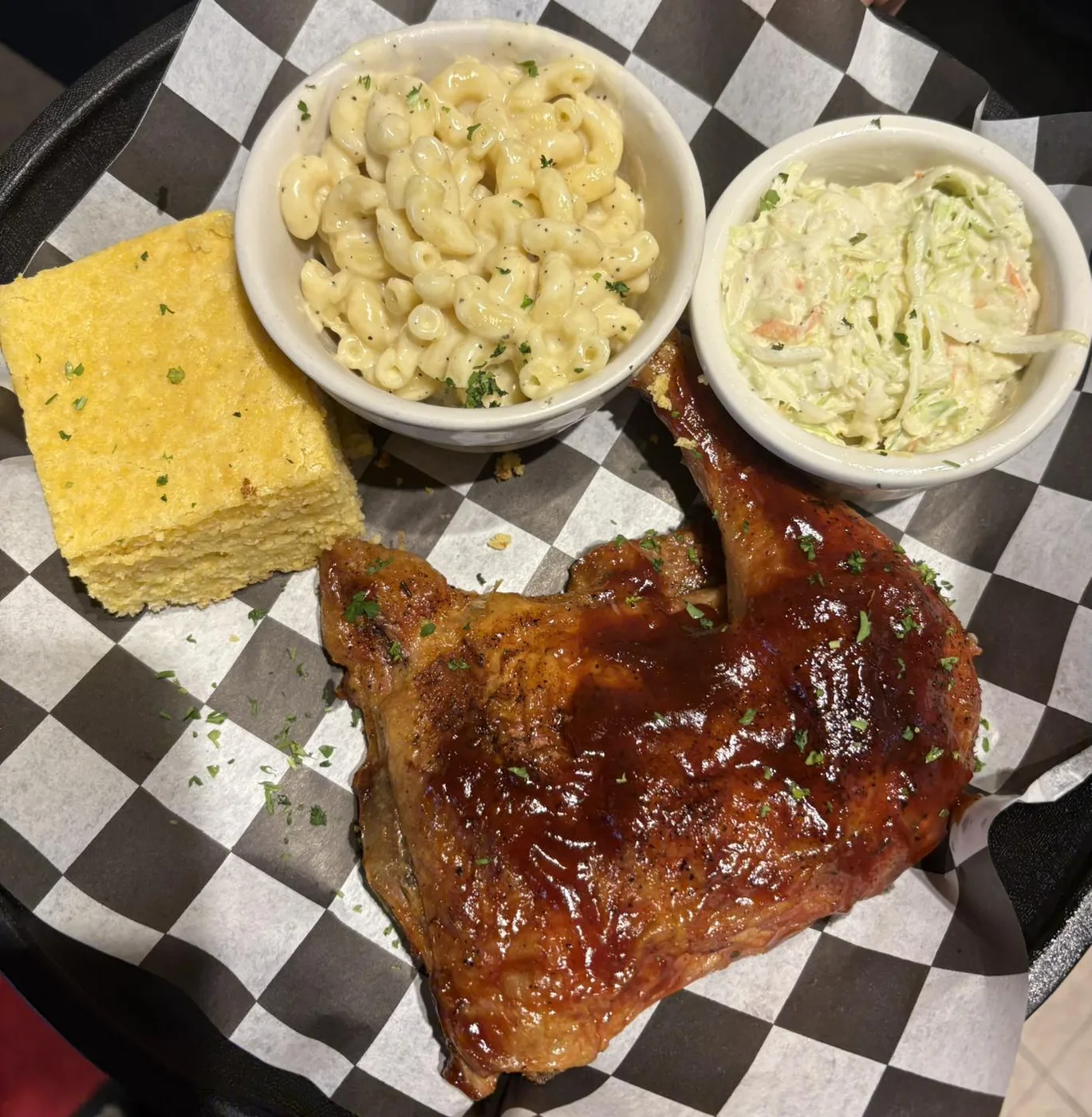 BBQ chicken with mac & cheese, slaw and cornbread