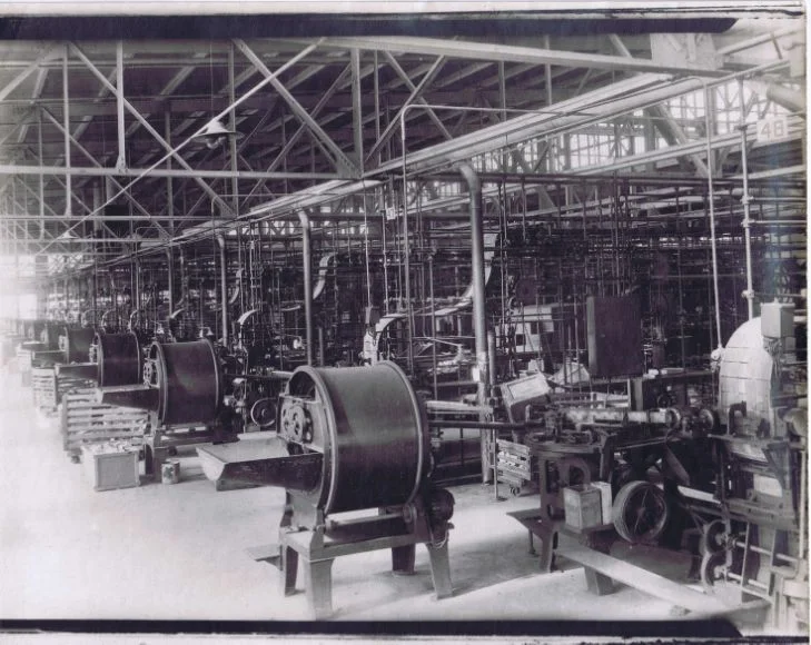Workers’ machinery lining the Ohio Match Company factory floor