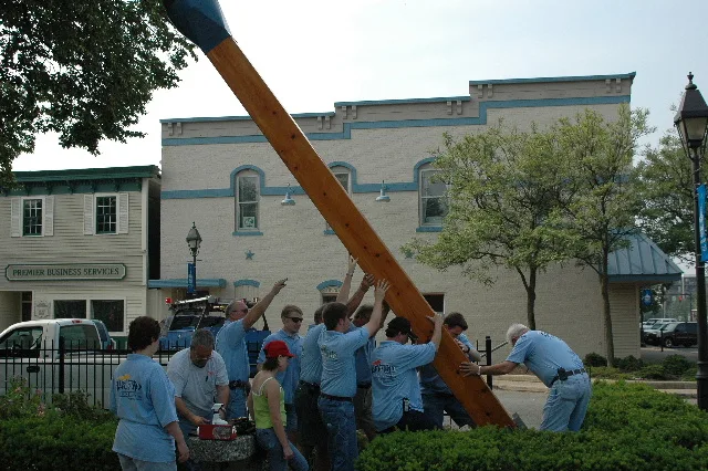 Volunteers raising the World's Largest Match landmark in downtown Wadsworth, Ohio