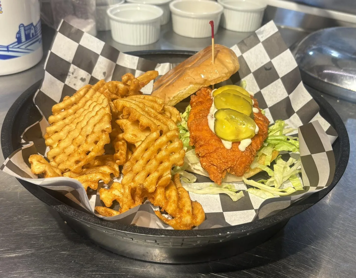 Nashville hot chicken sandwich with waffle fries